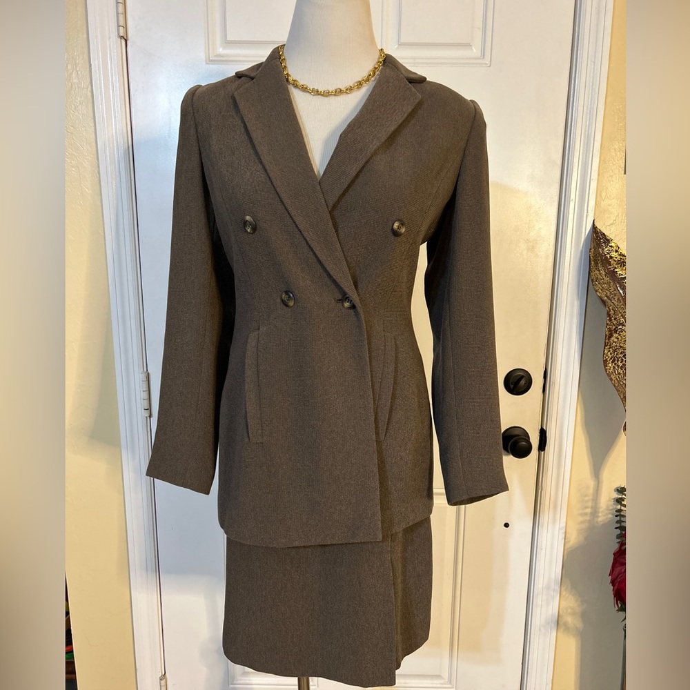 B. Bennett professional and classy skirt suit.